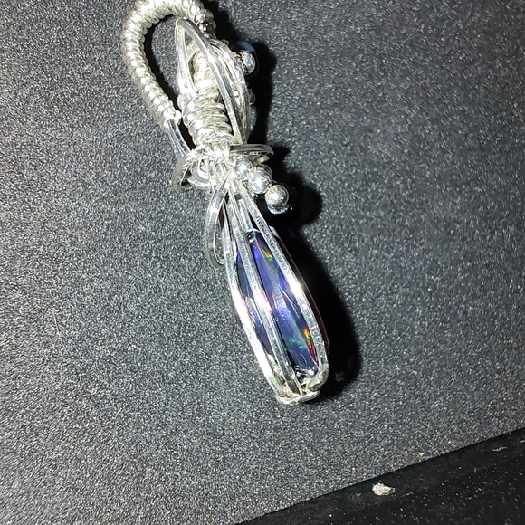Sterling silver wire wrapped genuine black faceted Ethiopian opal pendant - Picture 8 of 9